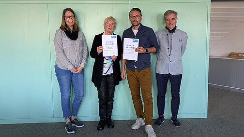 Gruppenfoto mit 4 Personen